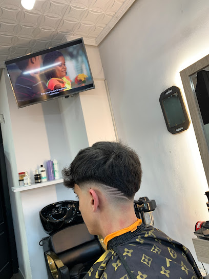 Foto La fama Barber shop